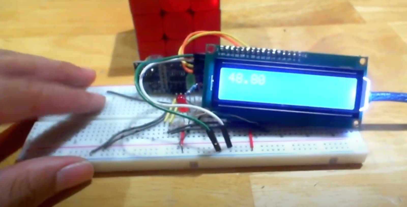 The first timer on a breadboard, showing a time on the LCD